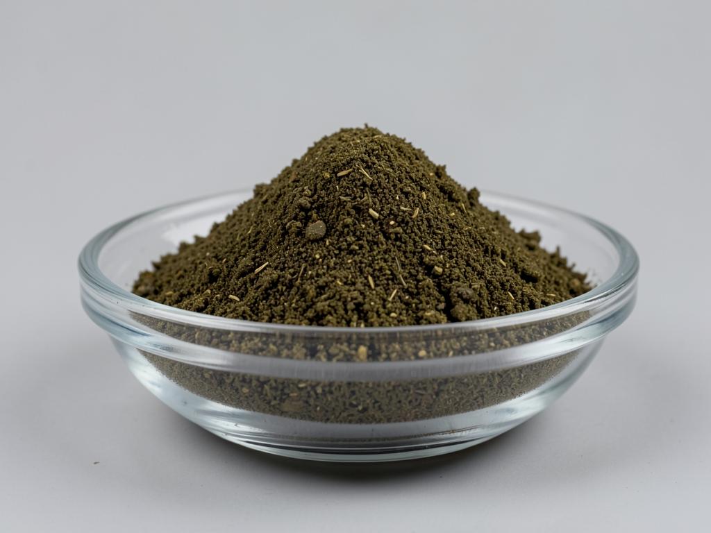 Bladderwrack Powder shown as a dried milled botanical powder in a shallow dish in a neutral studio photograph