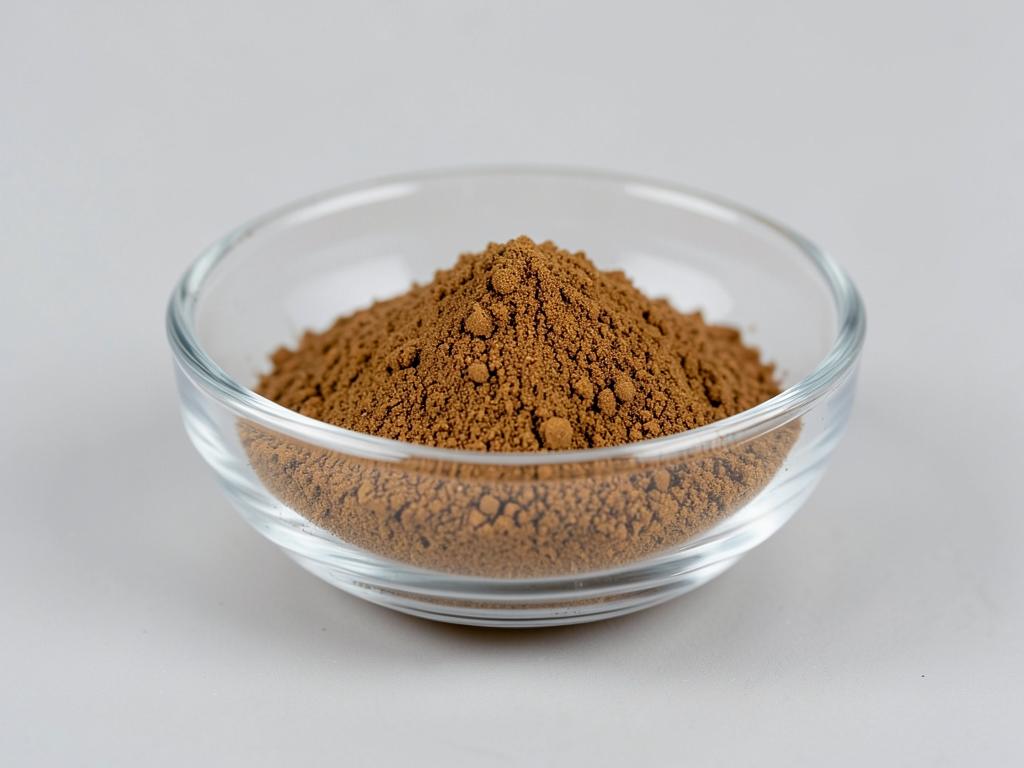 Dandelion Root Extract shown as a fine concentrated extract powder in a shallow dish in a neutral studio photograph