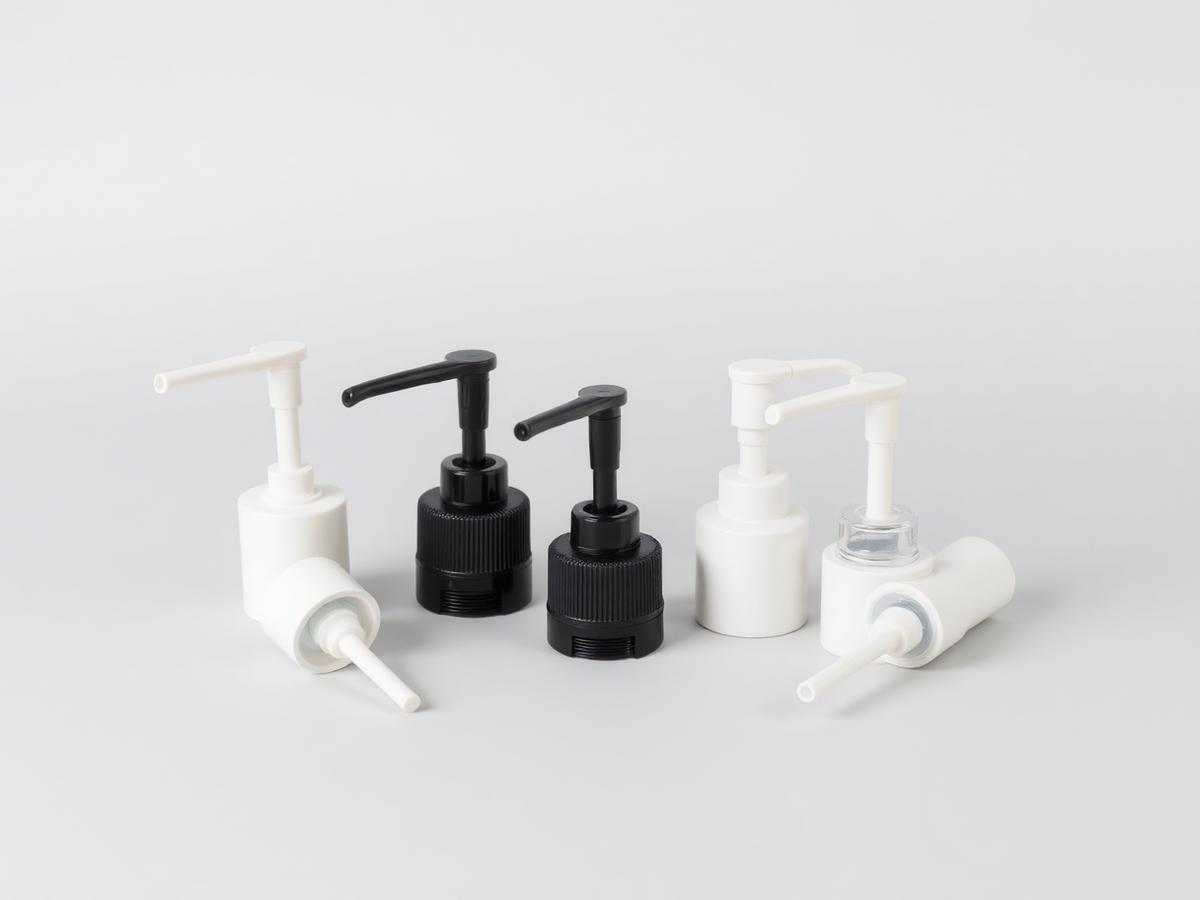 Plastic lotion and soap dispensing pump heads — product illustration
