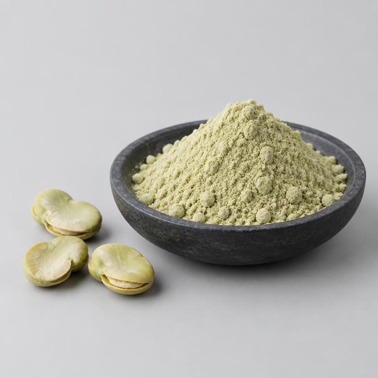 Illustrative studio sample of pale green-beige Fava Bean Peptide powder beside split fava beans