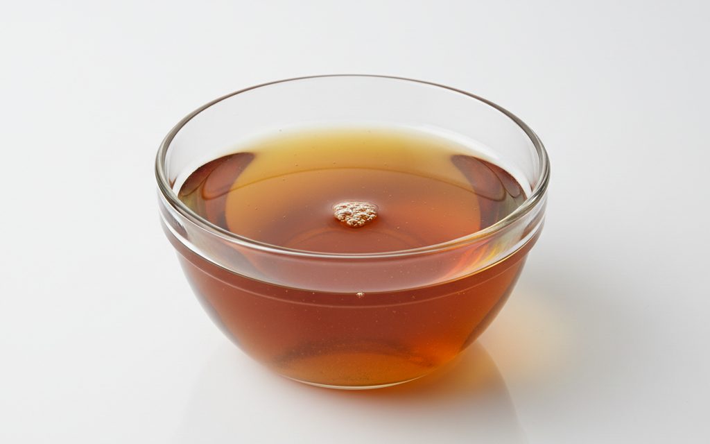 Grade confirmed at quotation — strong-smelling clear or amber liquid solvent, sometimes appearing slightly viscous, designed for deep penetration of grease and carbon, studio product photograph