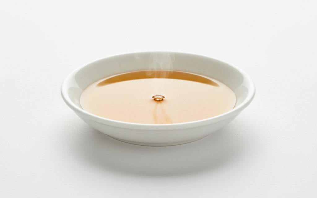 Grade confirmed at quotation — clear, water-thin solvent or emulsified amber liquid, featuring a rapid evaporation rate and high solvency for removing oils and greases, studio product photograph