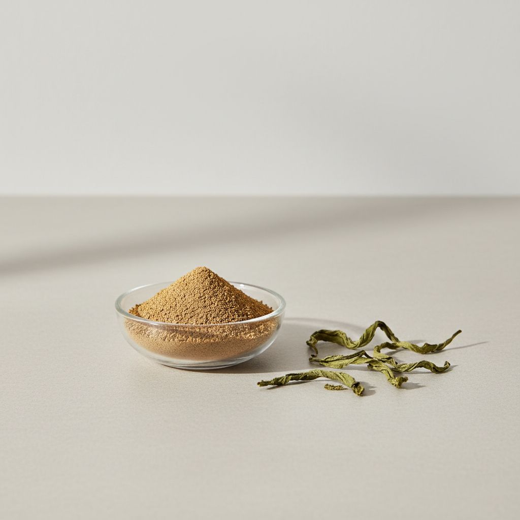 Illustrative studio sample of Instant Oolong Tea Powder beside Camellia sinensis source material