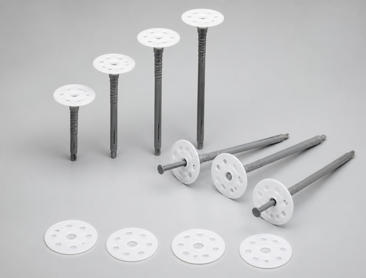 Plastic insulation fasteners with wide perforated washer plates in several lengths, shown with separate washer discs