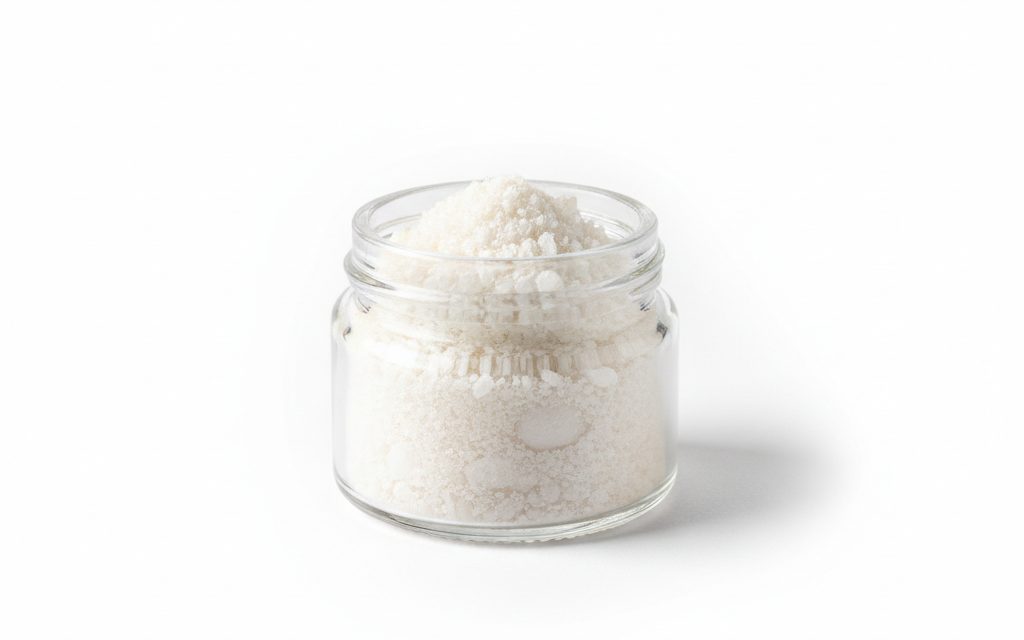 L-Arginine — white to creamy-white crystalline powder or granules that are highly stable and exhibit a dry, free-flowing characteristic under normal conditions, studio product photograph
