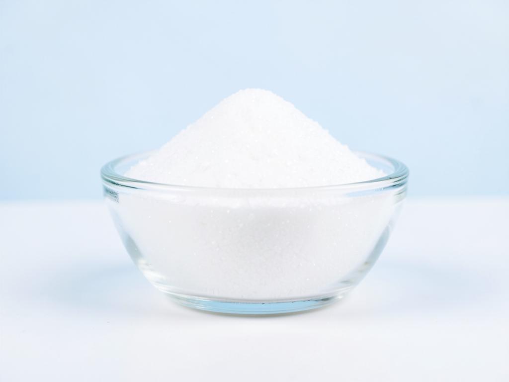 L-Fucose shown as a neutral studio product photograph of the bulk material