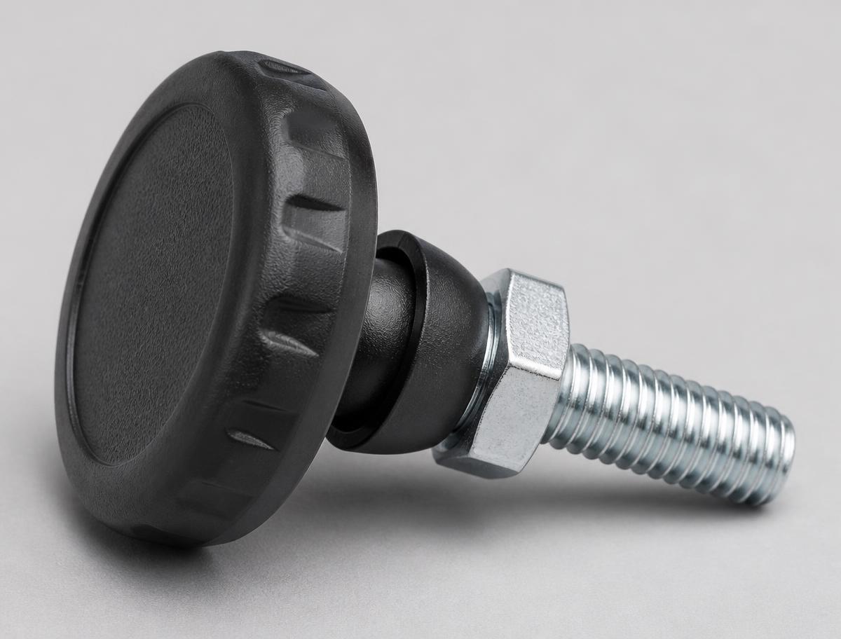 Single black plastic levelling foot on its side showing the moulded base pad, swivel joint, threaded stem and hex lock nut