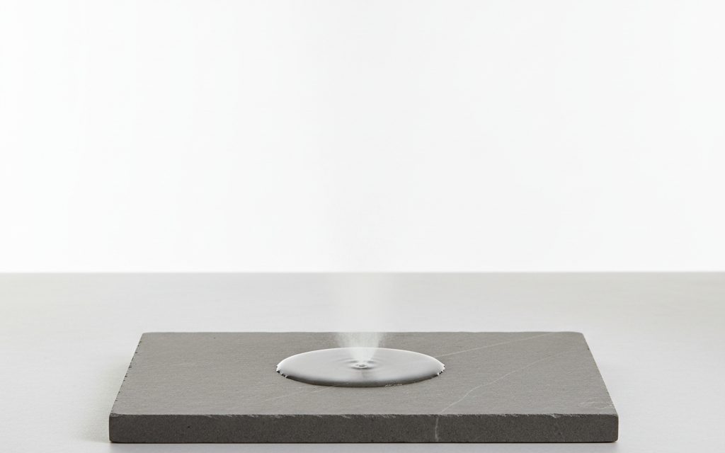 Grade confirmed at quotation — clear, colorless pressurized aerosol mist or bulk liquid solvent with a thin consistency and rapid evaporation rate, studio product photograph