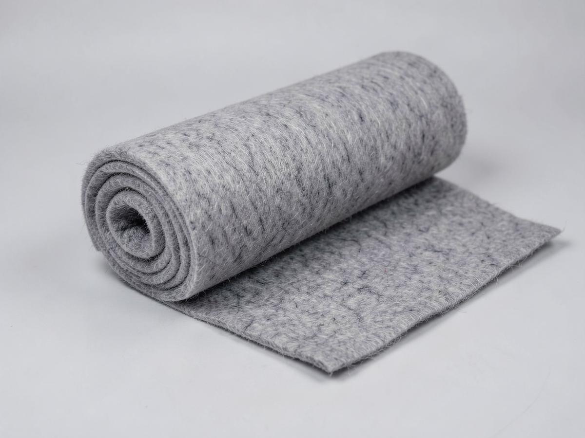 Grey needlepunched polypropylene nonwoven felt roll with fibrous needled texture