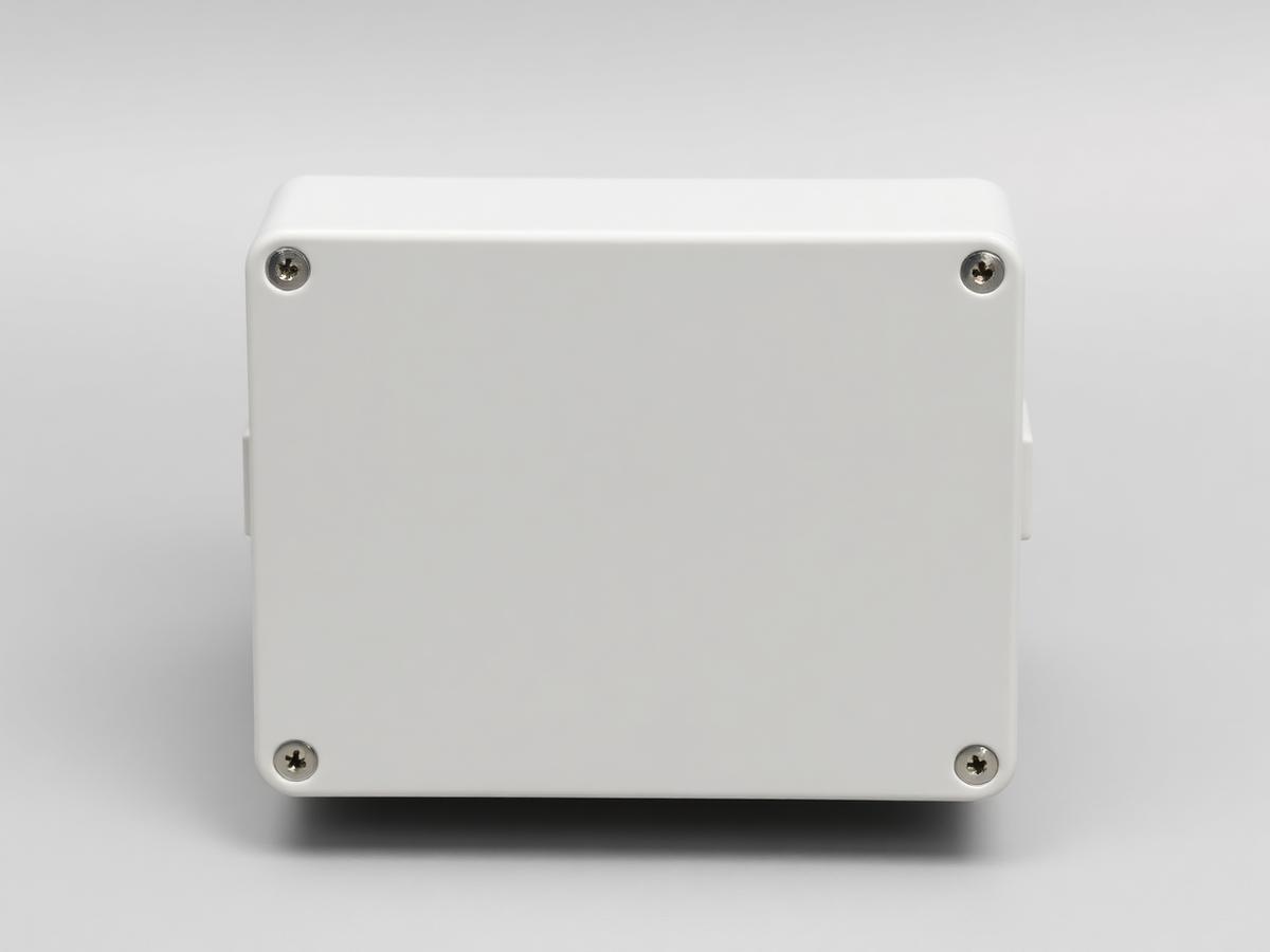 Unbranded grey plastic project enclosure box with a screw-down lid and corner fixing screws