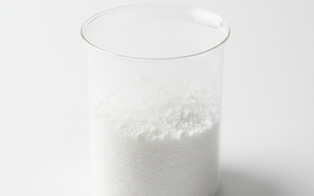Grade confirmed at quotation — fine white granules or coarse powder with a strong, pungent bleach-like odor, often containing high concentrations of active chlorine, studio product photograph