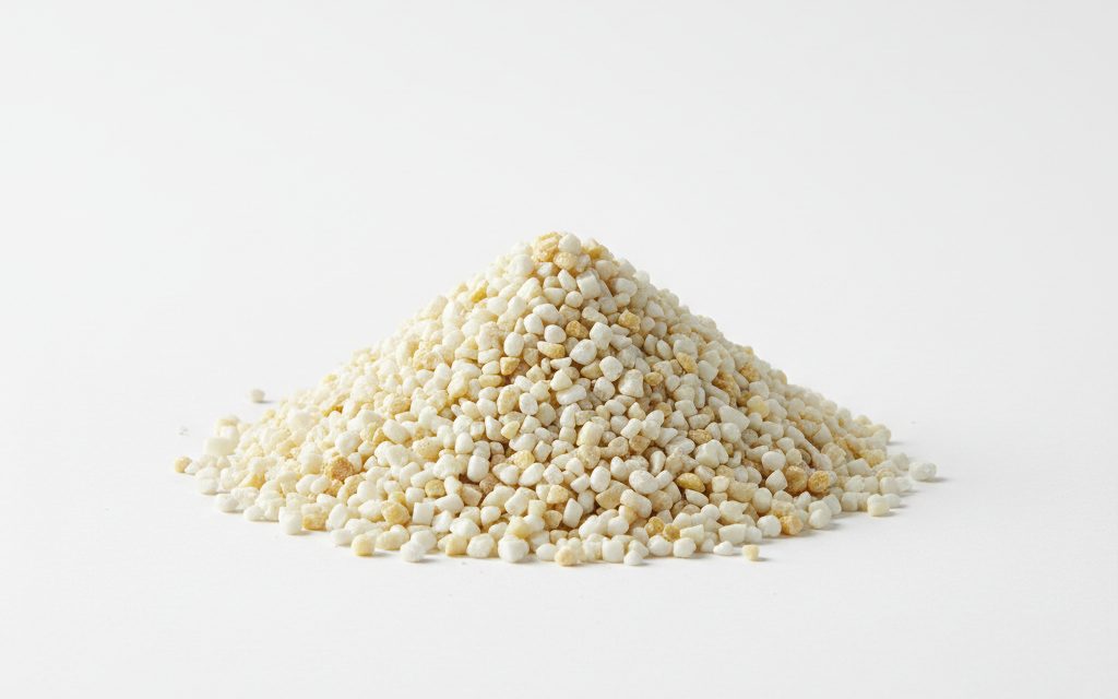 Grade confirmed at quotation — white to light-yellowish granules or small pellets, exhibiting a waxy or firm texture depending on the carrier resin used, studio product photograph